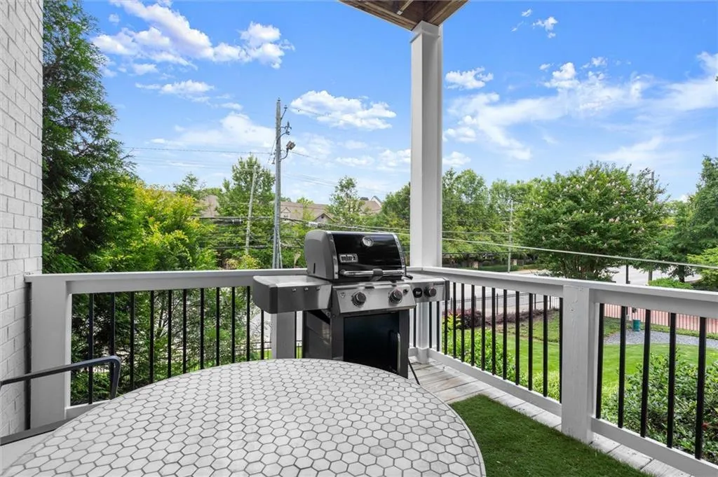 This outdoor patio is located right off the kitchen with easy access to the grill.