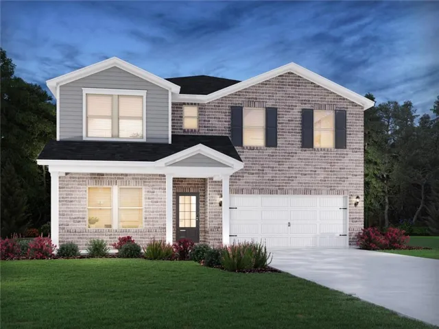 Two-story residence featuring brick and siding facade, covered front porch, attached two-car garage, and established landscaping