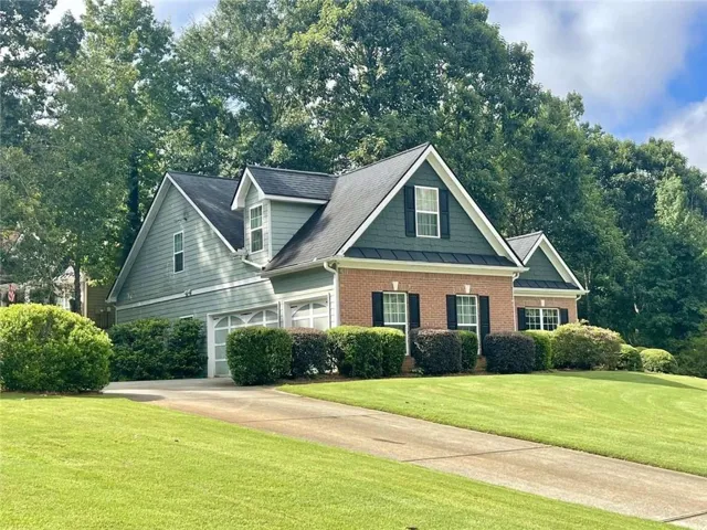 Brick and siding exterior with gabled roof lines