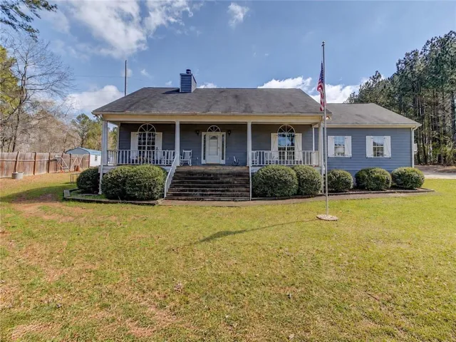 Front entrance with rocking chair porch.