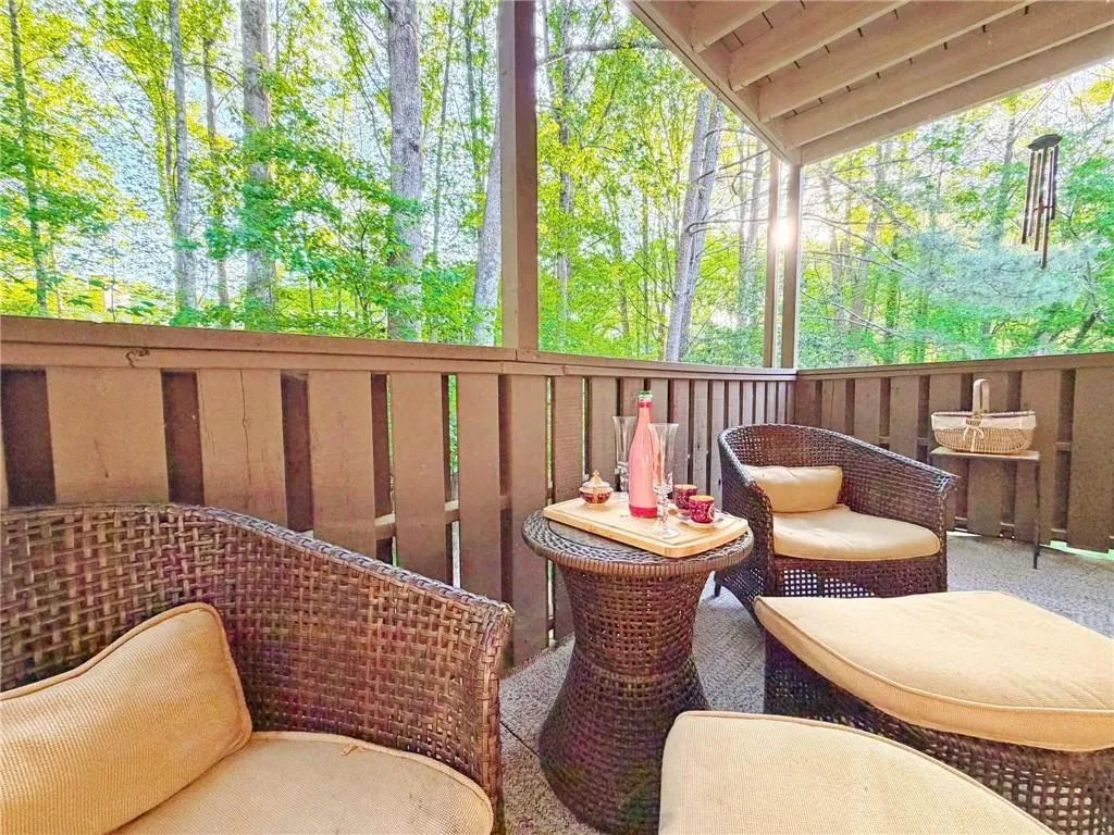 Sunroom featuring an outdoor hangout area