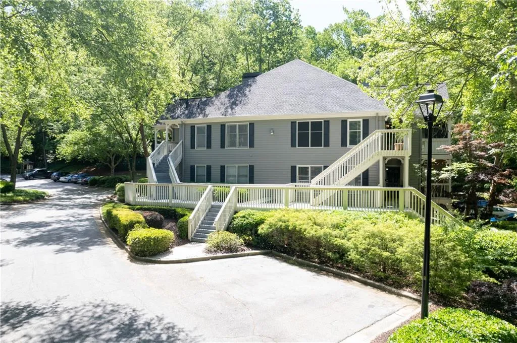 Designed for a lifestyle of ease & comfort, this residence offers maintenance-free living with the added peace of mind of a new AC unit & trex style decking on the stairs.