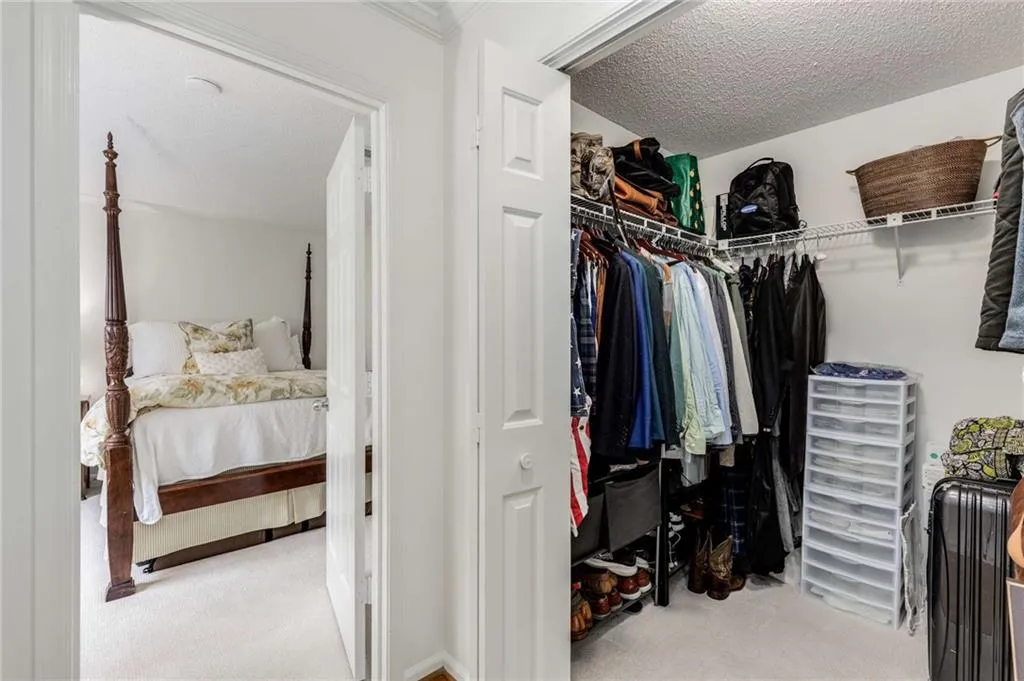 The guest bedroom oversized walk-in closet. Space for your summer & winter wardrobes!