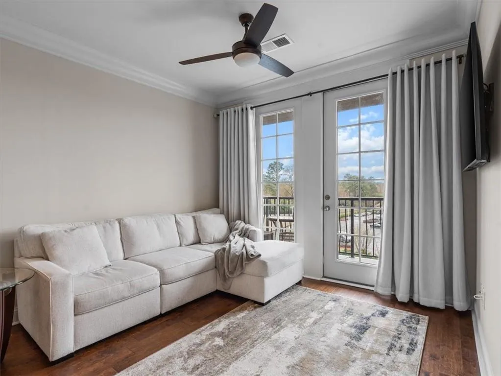 french doors lead to private balcony