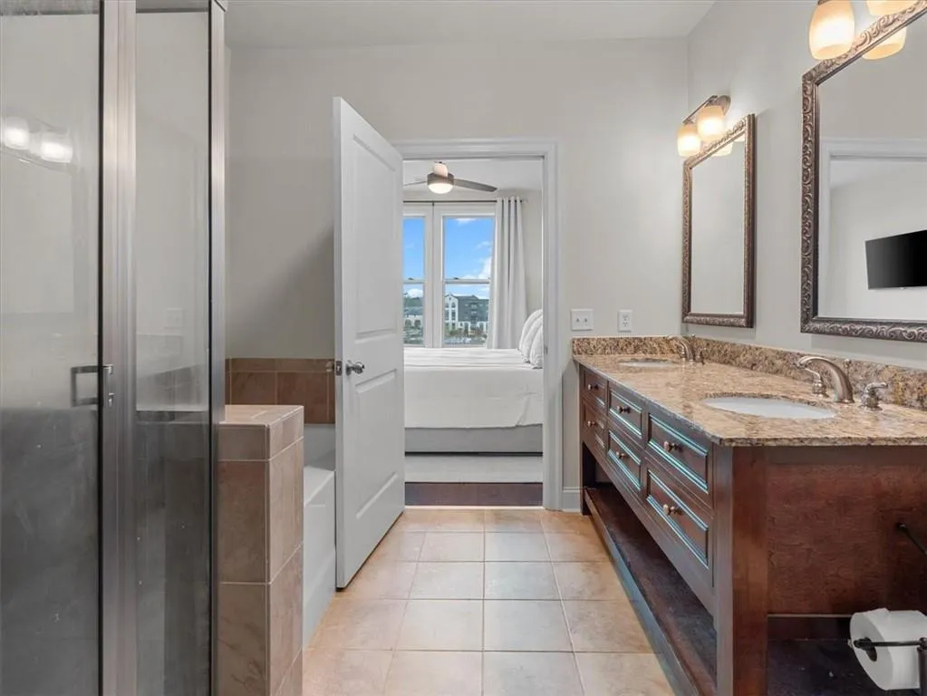 separate soaking tub and glass shower