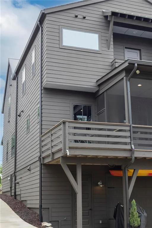 Close up shot of back with uncovered porch area for grilling