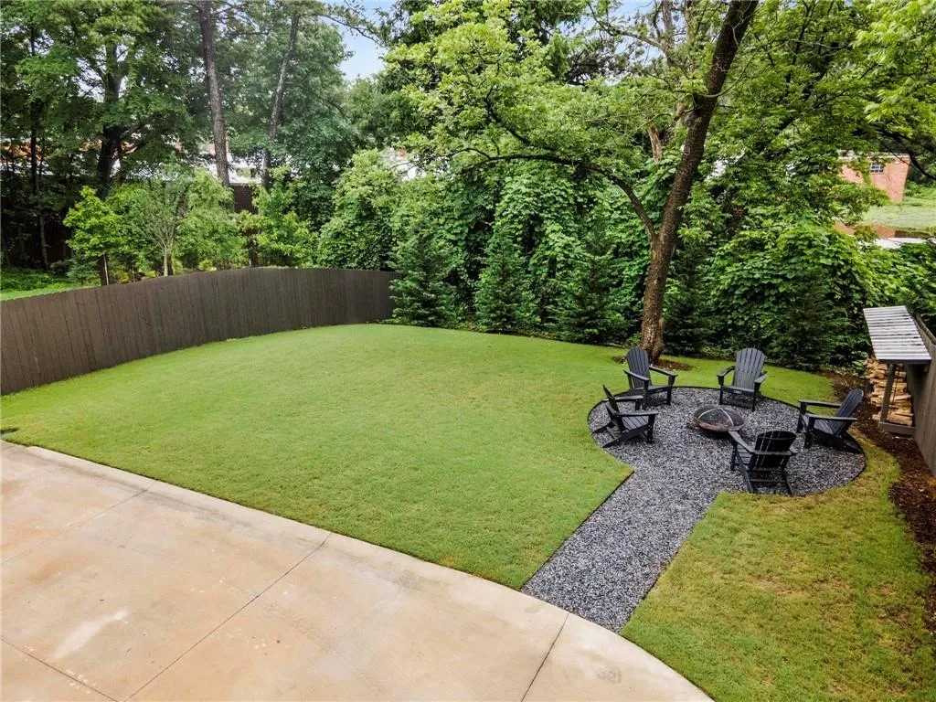 View of private back yard and firepit