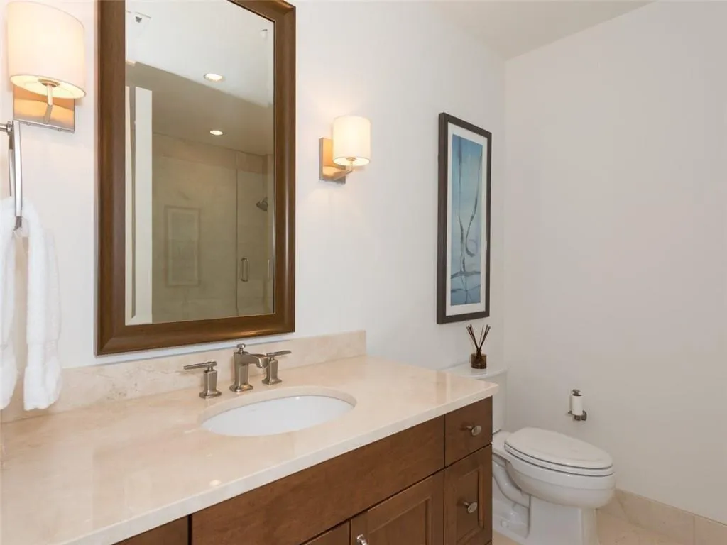 Bathroom with vanity, a shower with door, Secondary Bathroom with Shower Tub Combo
