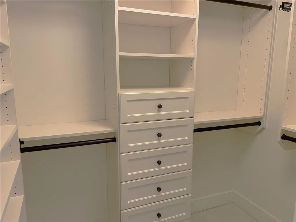 Customized Walk in closet In Primary Bedroom