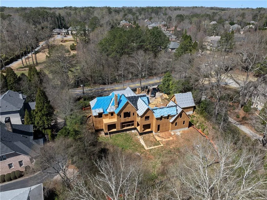 Drone / aerial view featuring a view of trees