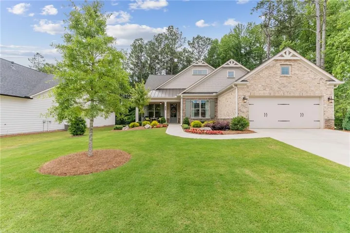 Gorgeous ranch on a full basement with woods on 2 sides providing so much privacy!