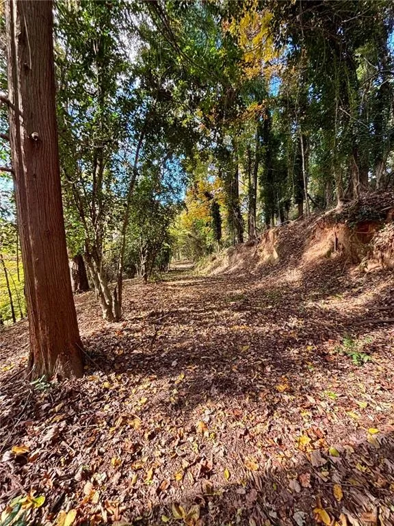 Lower road leads to private river trail