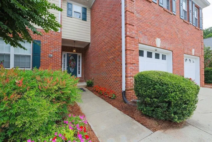 Entrance to property with brick siding