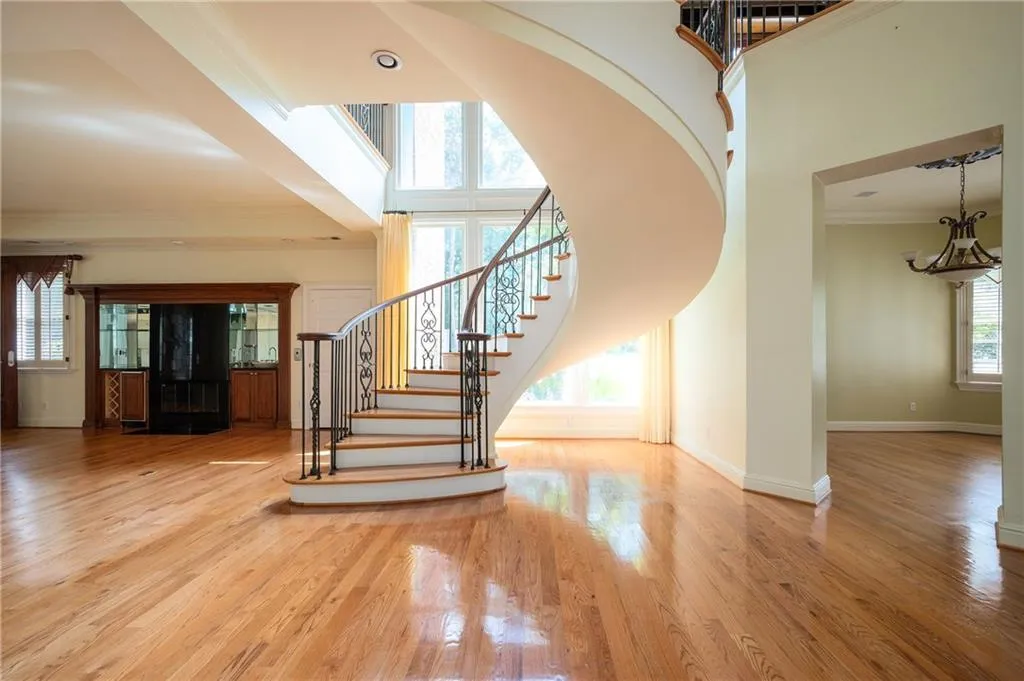 Cascading stairs and wall to ceiling windows
