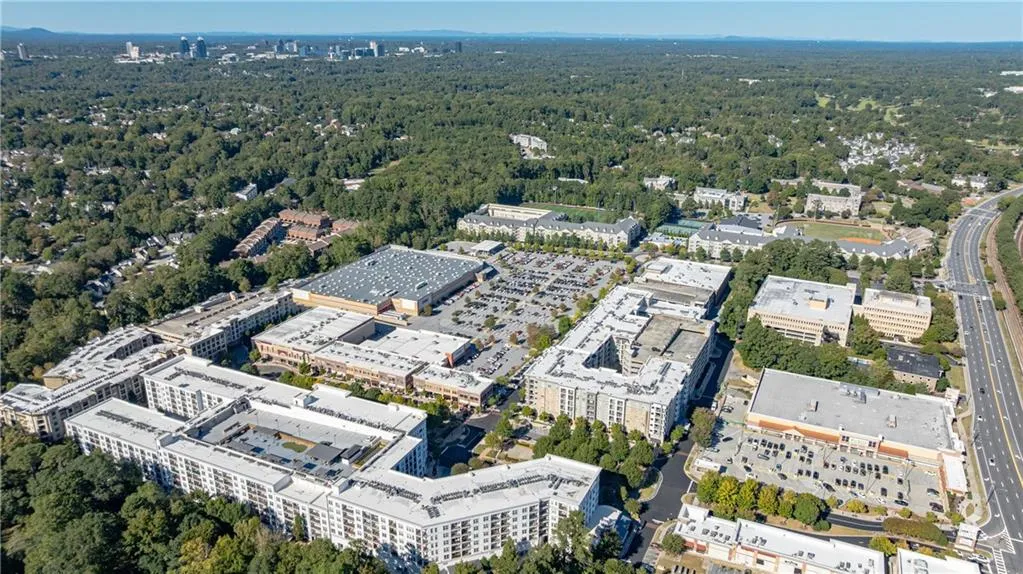 Aerial overview of property's location featuring a heavily wooded area Aerial overview of property's location featuring a heavily wooded area