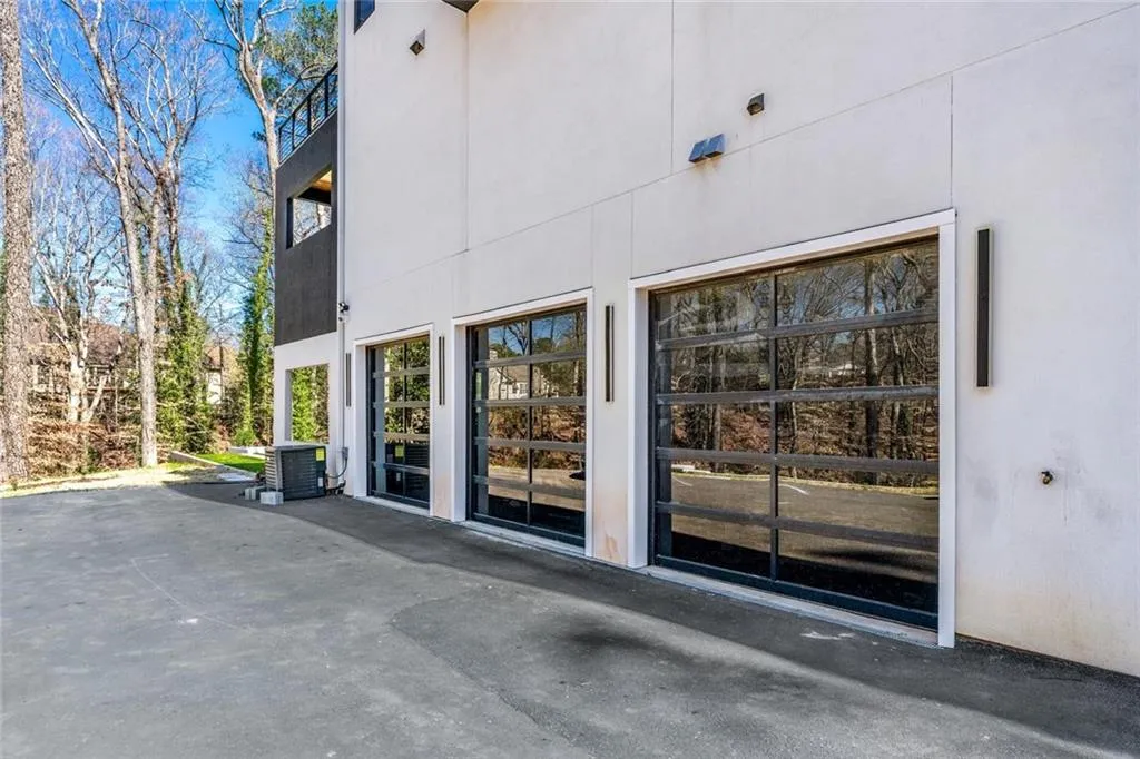 Doorway to property with stucco siding and a patio