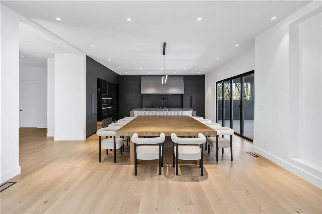 Dining space with recessed lighting and light wood finished floors
