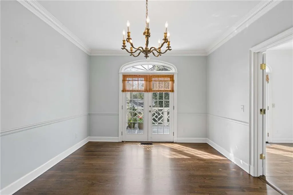 Large separate dining room or den. French doors to deck