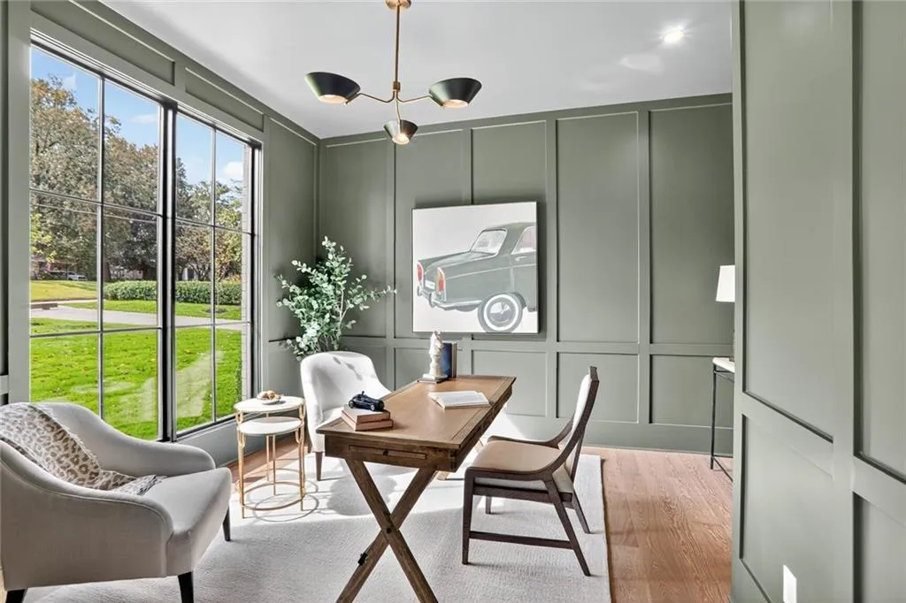 Office with yummy dark olive paneling(darker in person) sets a serene mood.