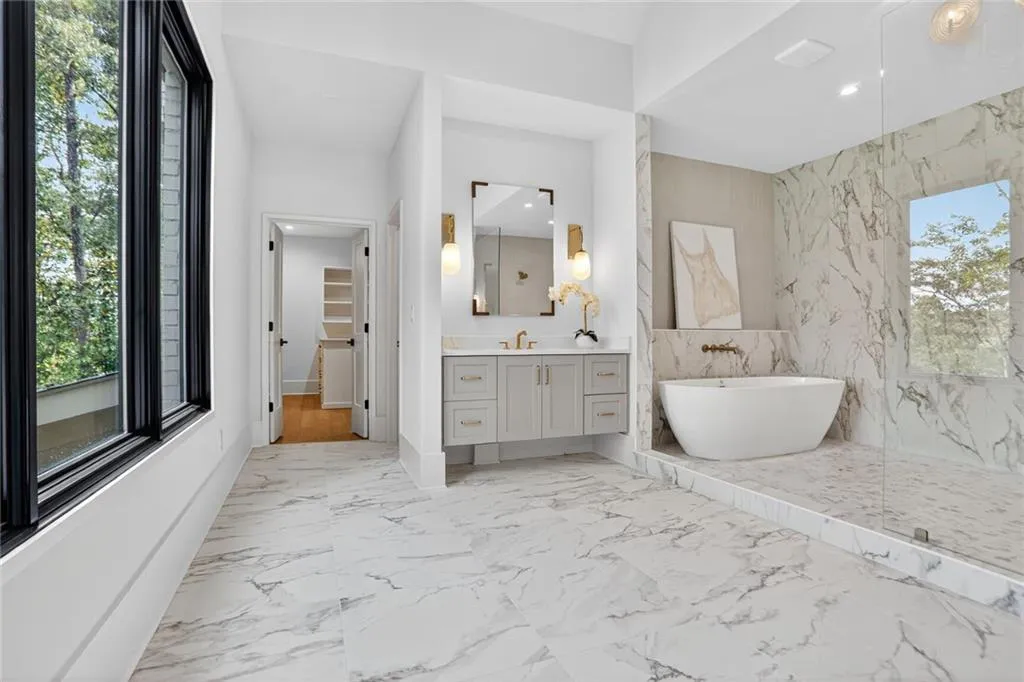 You'll feel like you're in a 5 star spa with this amazing Primary bathroom.