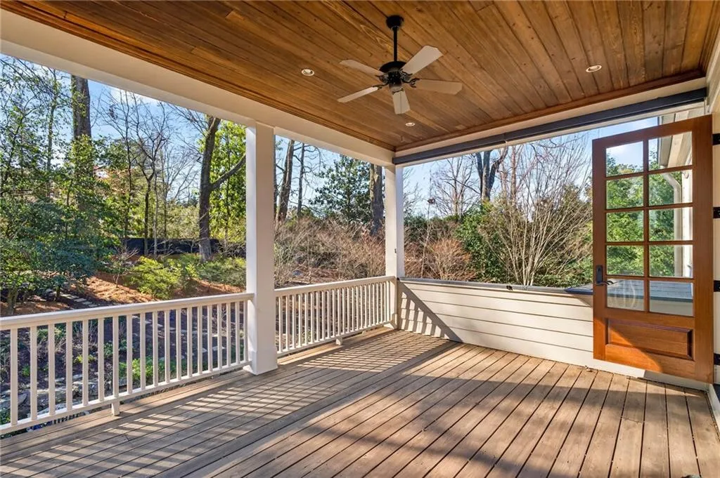 Wooden deck with ceiling fan