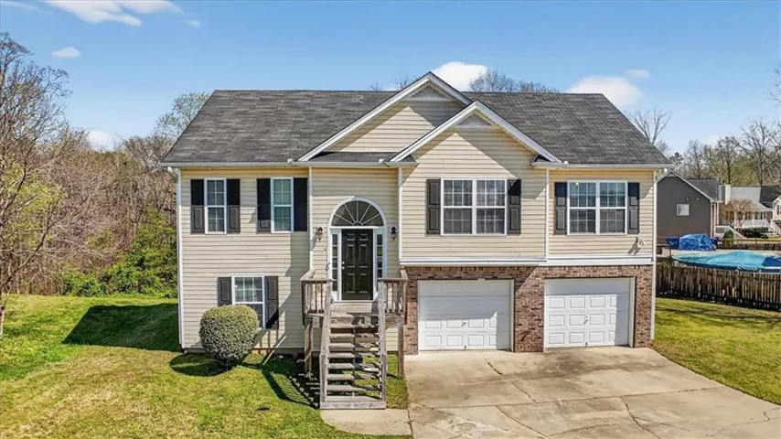 Beautiful exterior with welcoming curb appeal and a peaceful neighborhood setting.
