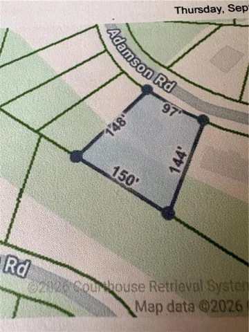 Property Plat. Illustrating the property boundaries and dimensions along Adamson Rd