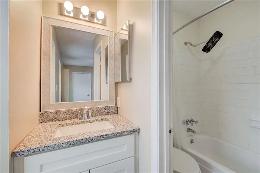 Full bathroom with  shower combination and vanity