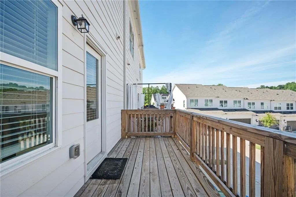 Wooden deck featuring a residential view