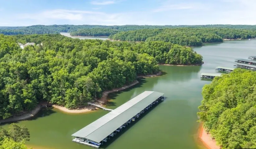 Expansive Waterfront Community featuring a fully deeded, covered boat dock.