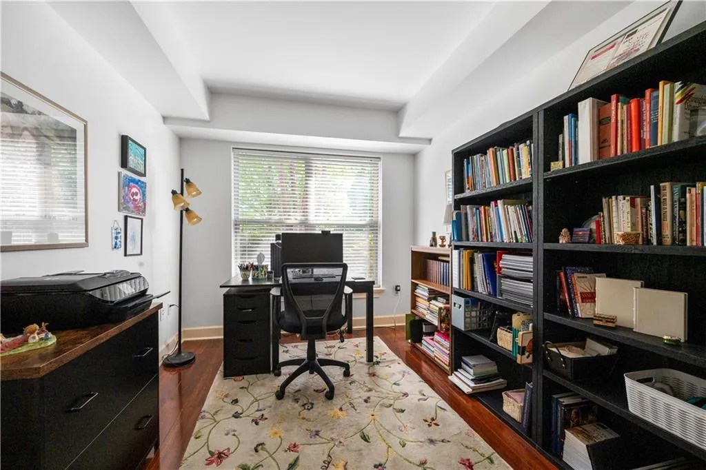 Office area featuring wood finished floors