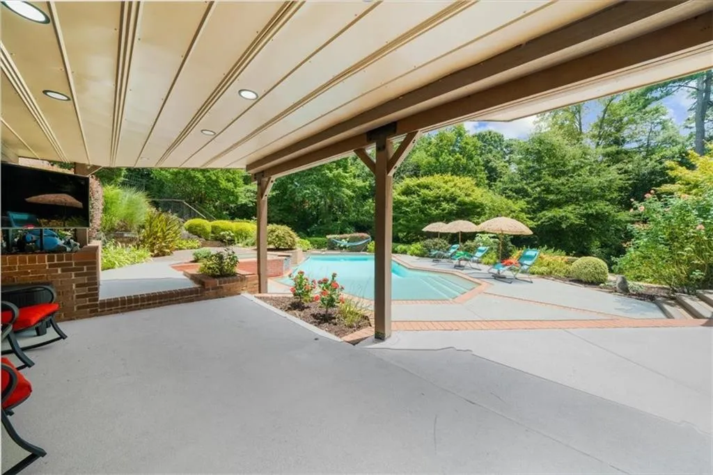 View of patio / terrace with an outdoor pool
