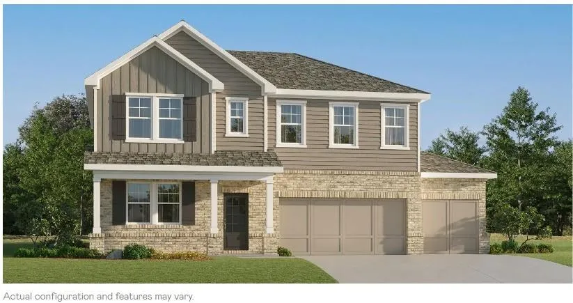 Two-story home with a tan brick and horizontal siding exterior