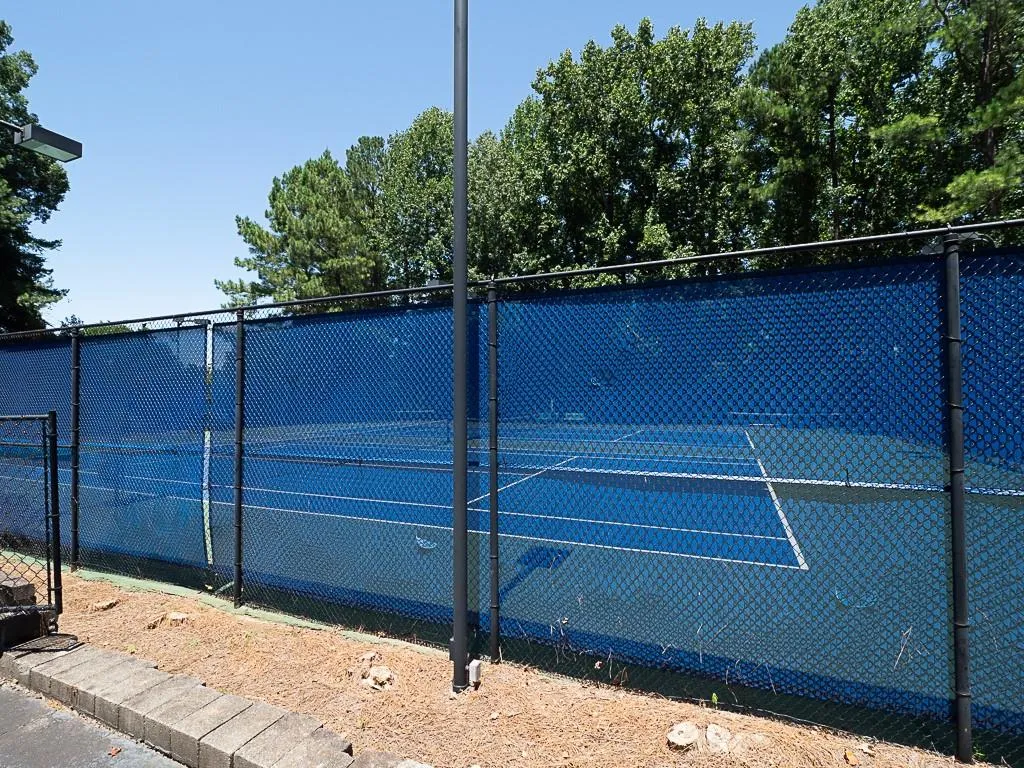Community Tennis next to Swimming Pool