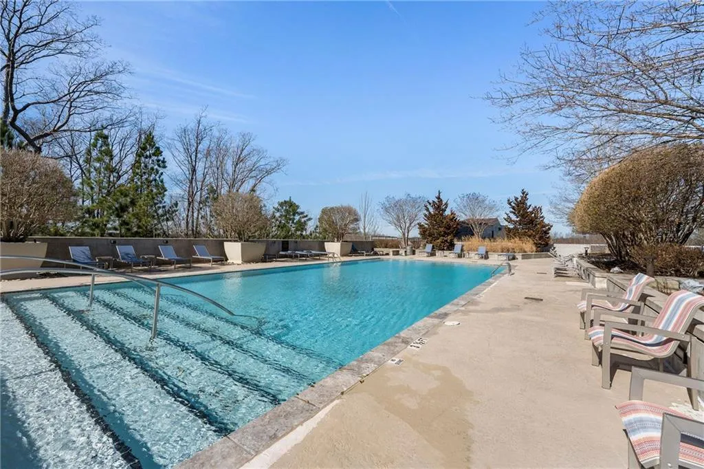 View of swimming pool featuring a patio area - new saltwater pool will be completed by the end of June 2024