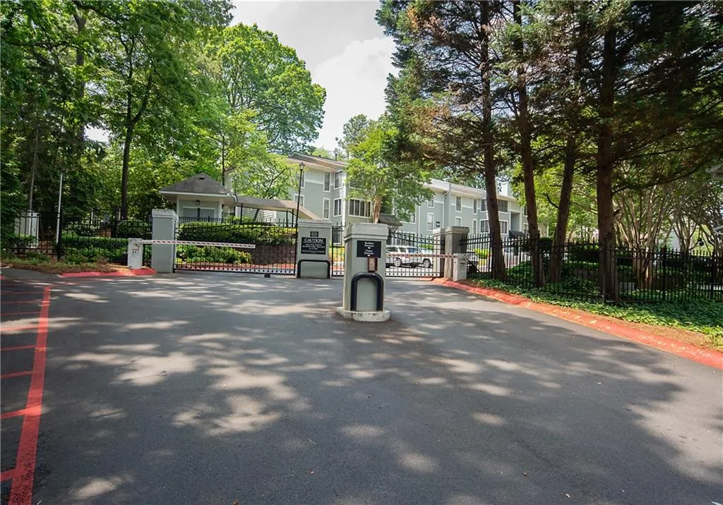 View of home's community featuring a gate