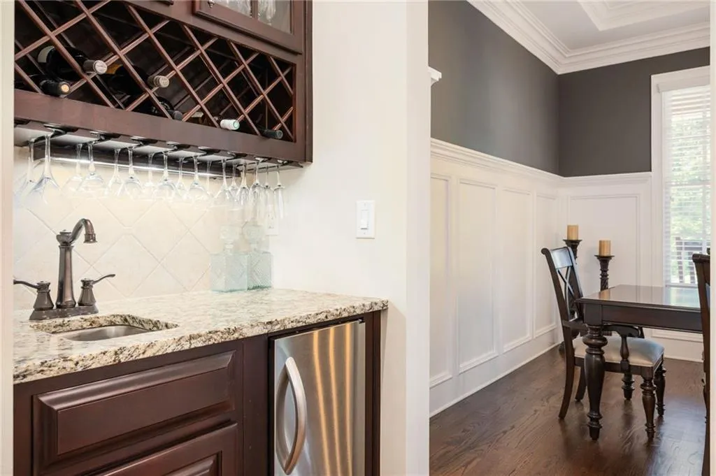 Wet bar with ice maker and wine racks
