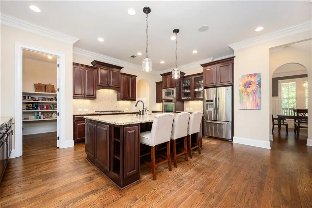 Kitchen view showing walk-in pantry