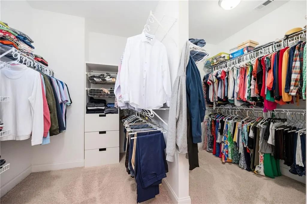 Walk in closet with two separate sides