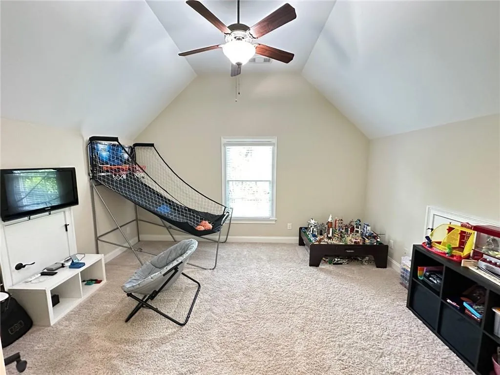 4th bedroom used as large playroom with vaulted ceilings
