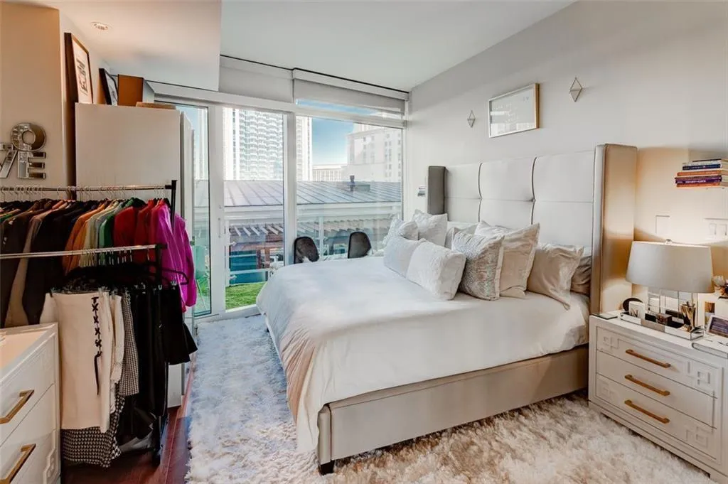 Bedroom with access to exterior and multiple windows Bedroom with access to exterior and multiple windows