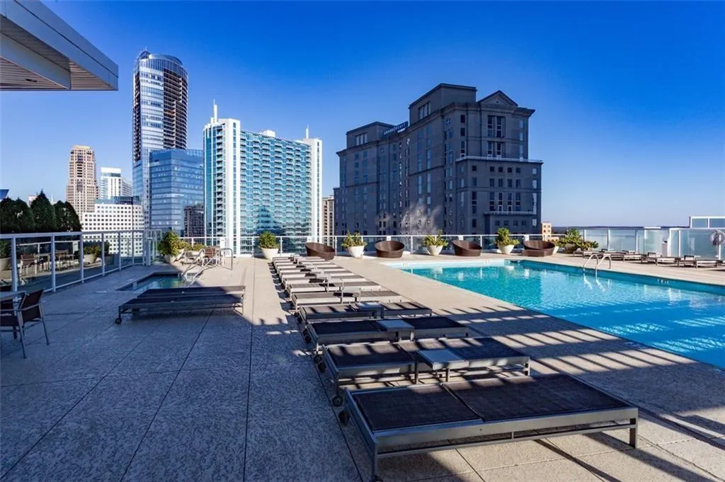 View of swimming pool featuring a patio View of swimming pool featuring a patio
