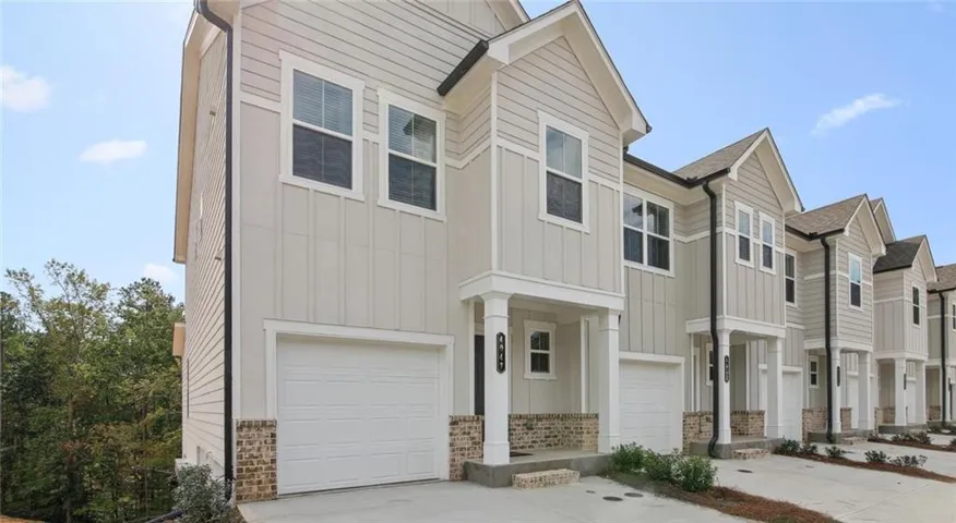 View of front of property with a garage