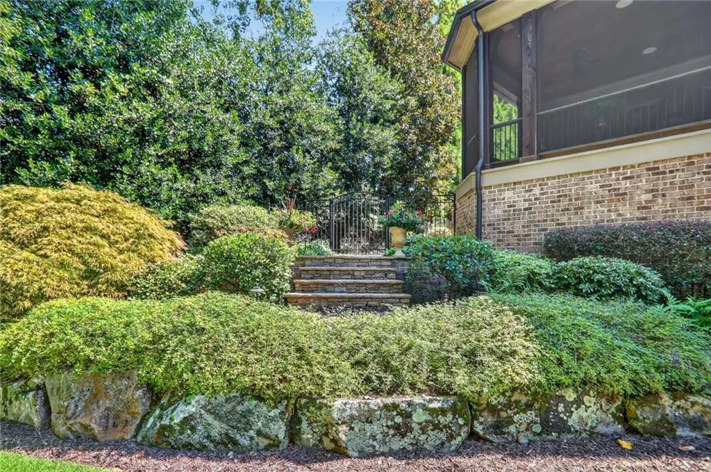View of yard featuring a sunroom