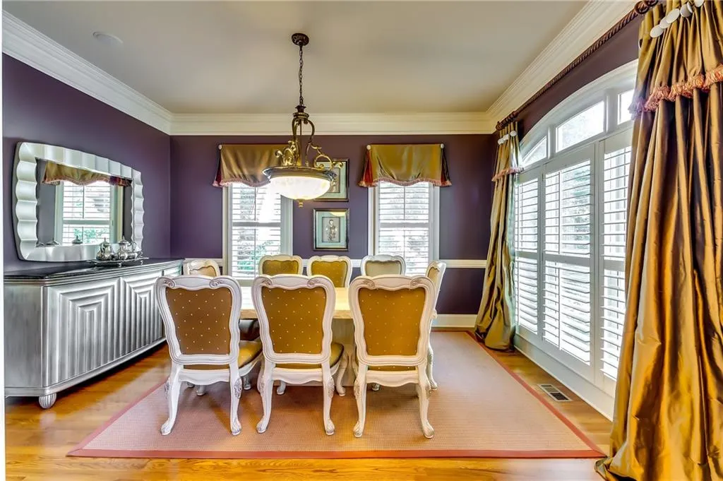 dining room can hold table with up to 12 chairs.
