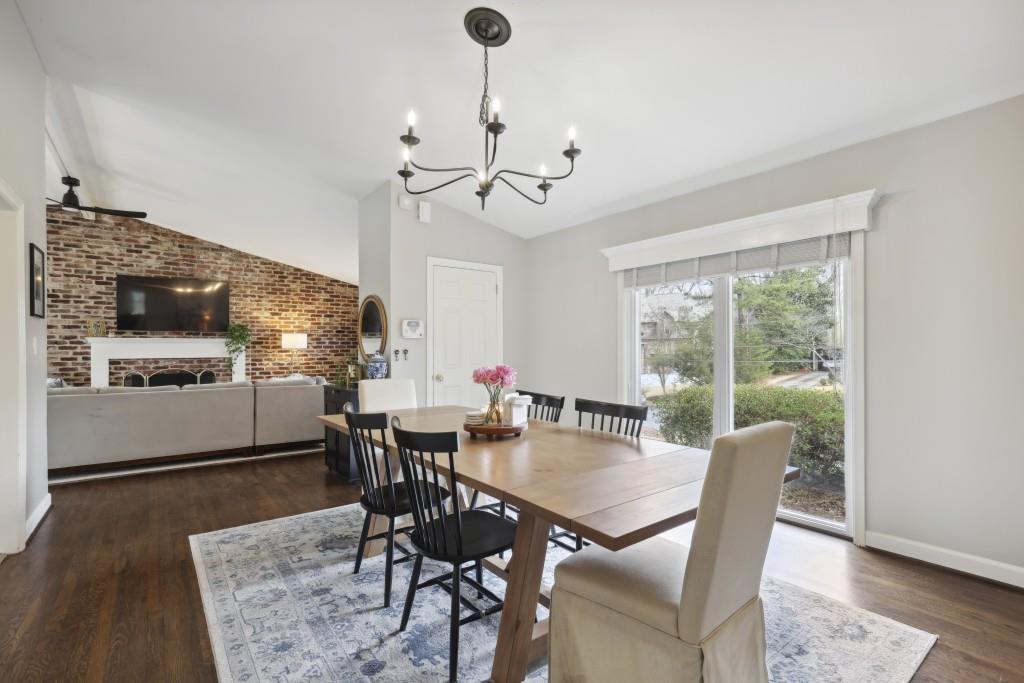 Oversized Formal Dining space Lined with Windows.