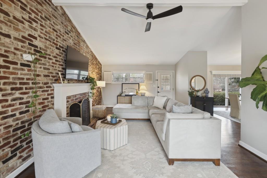Walk through the Front Door and Immediately be Wow-ed by the large Brick Fireplace.