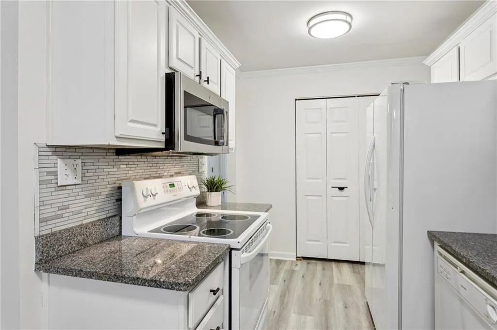 Laundry Closet Doors at back of kitchen