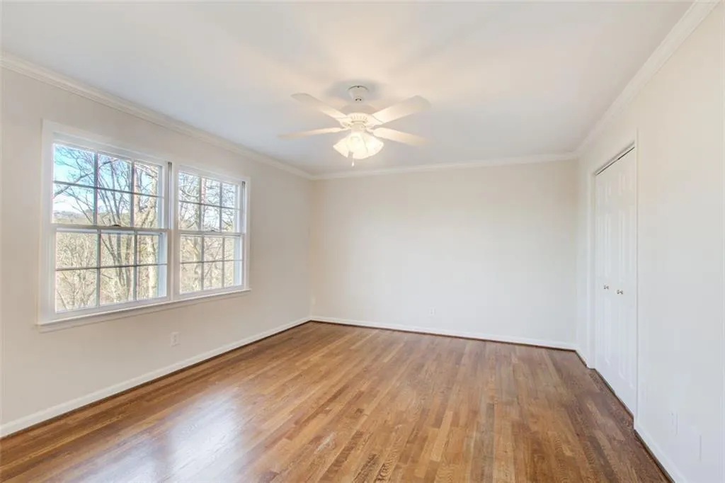 Primary bedroom on the main floor with 2 closets.