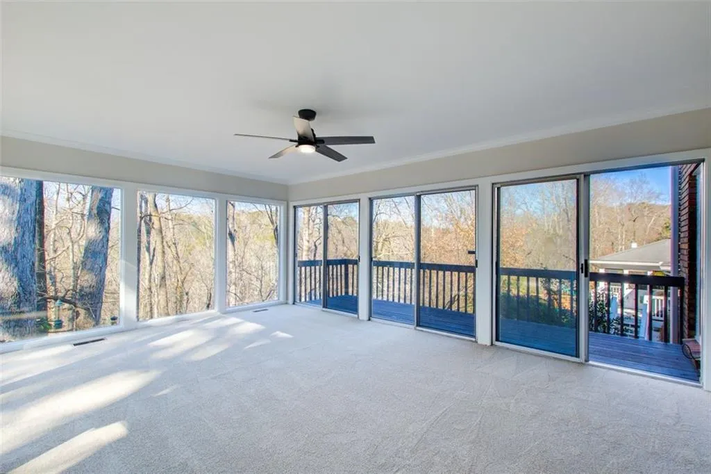 New carpet and new paint makes this a must see. Beautiful floor to ceiling windows.